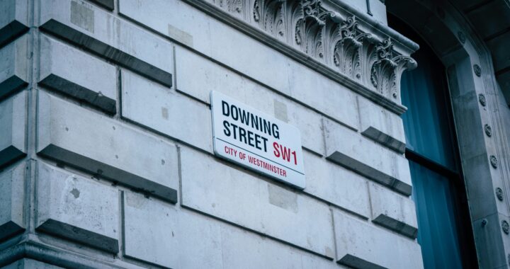 A road sign for Downing Street in London