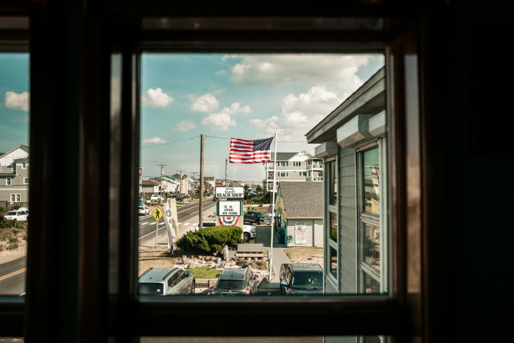 The starts and stripes viewed through a window
