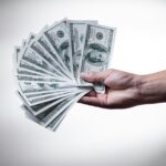 A handful of cash, fanned out